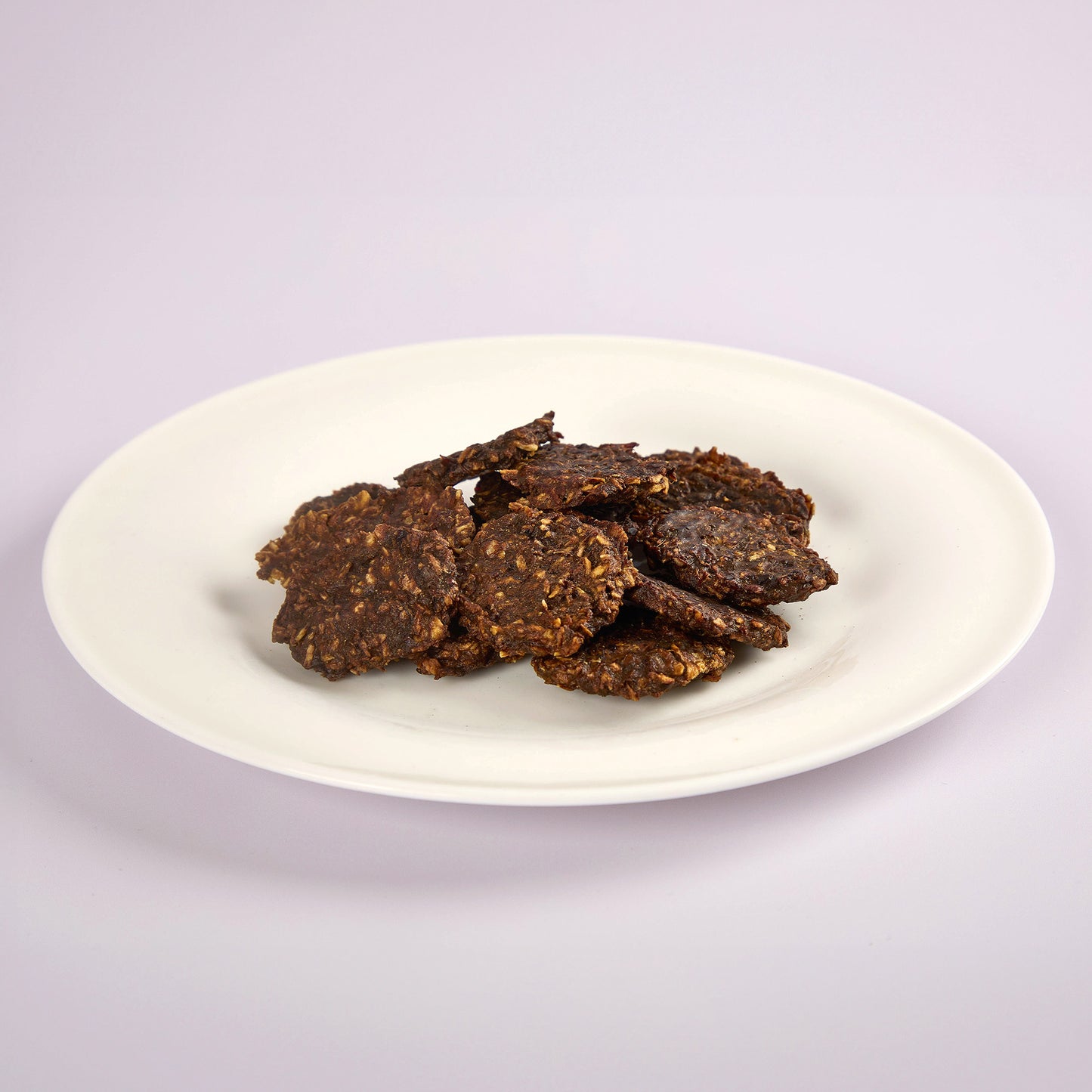 A plate of coconut crunch and beef natural dog treats