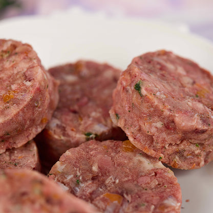 Close up of Rabbit raw dog food patties from LUNA & me