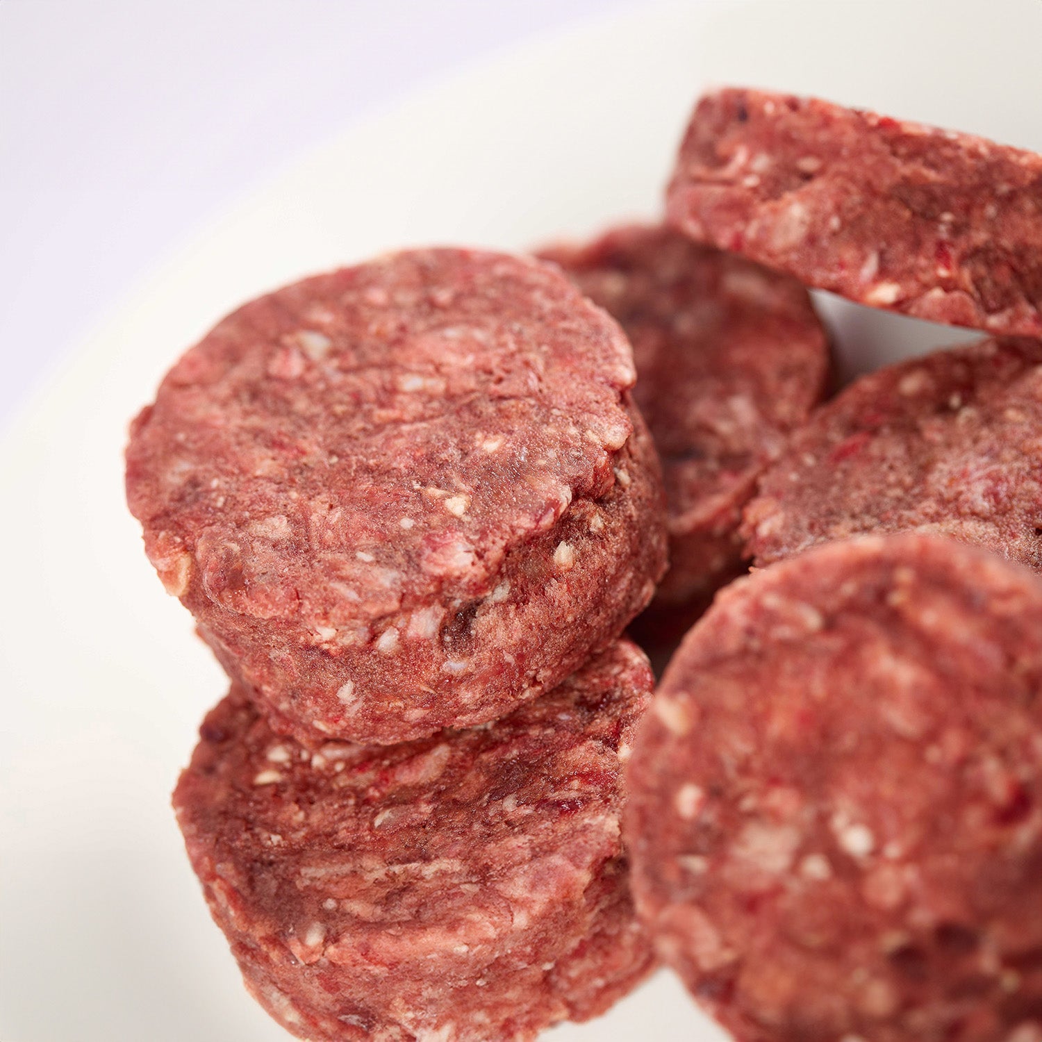 Close up of Sensational Beef raw cat food patties from LUNA & me